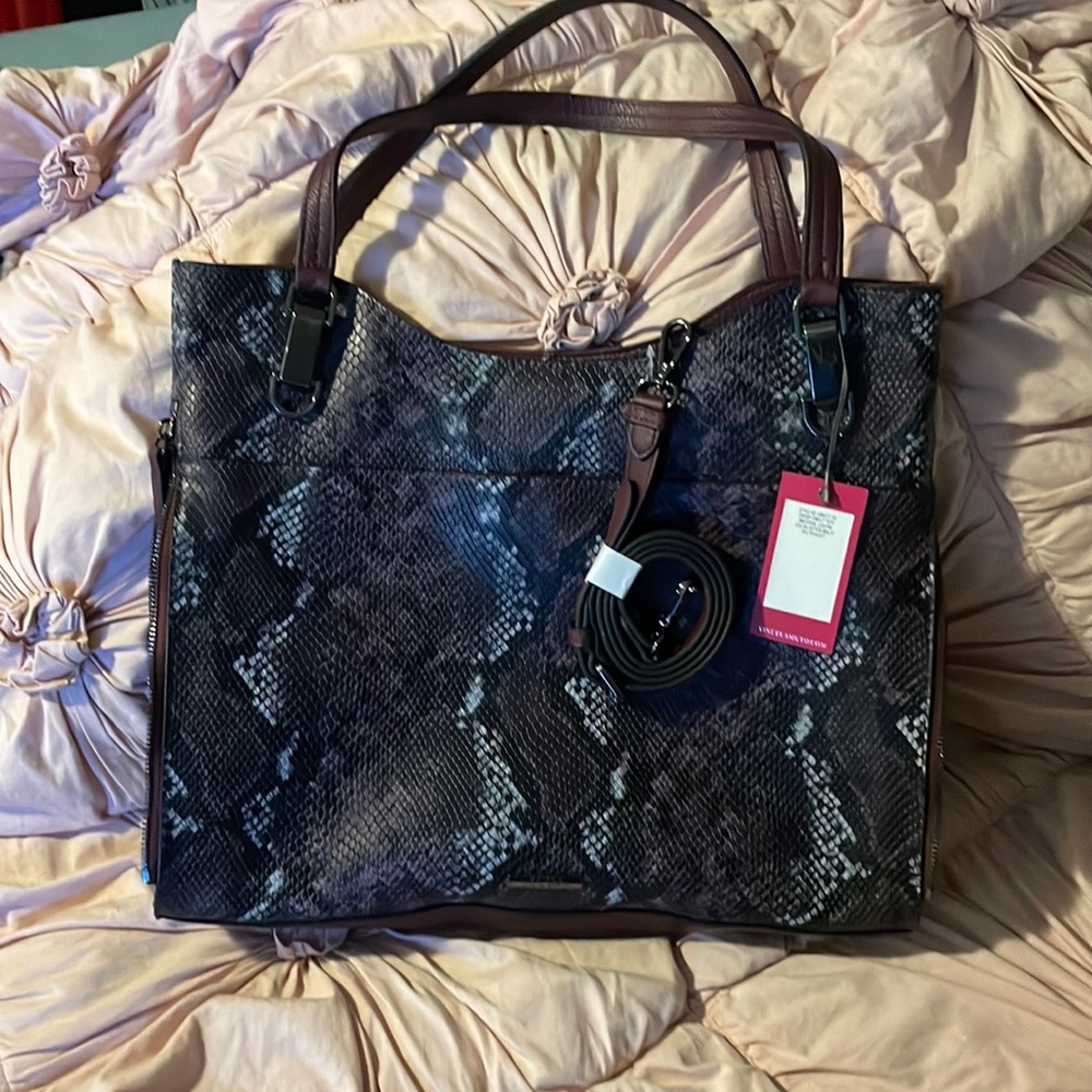 Vince Camuto purple snakeskin bag.